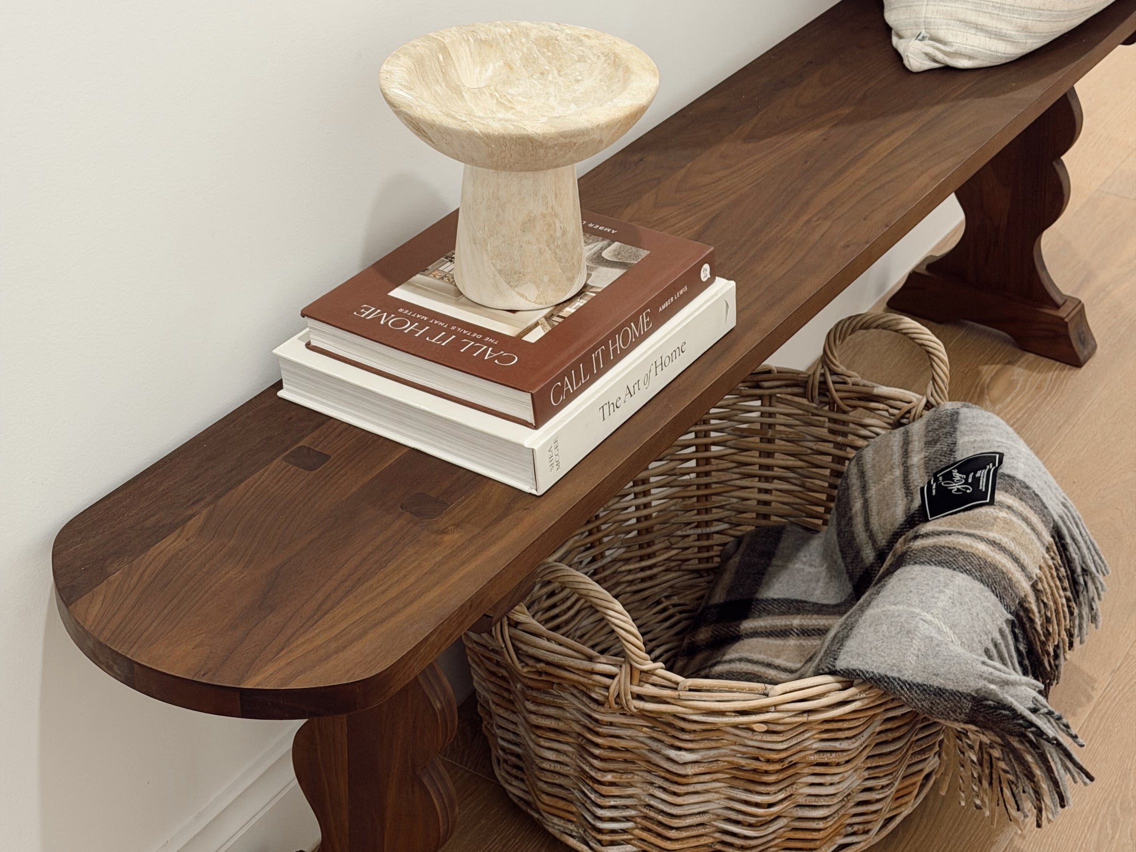 Rekindle Design Co French Bench placed at entryway of garage walkway